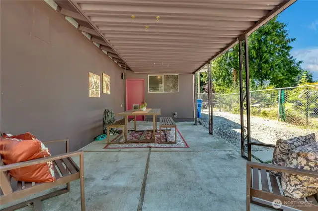 You could convert garage to living space and use this area for main back entertaining space...Stack washer and dryer stay!