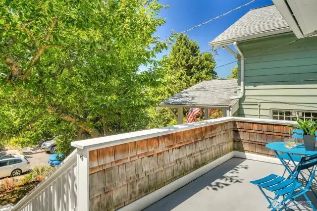 Large, sun-filled front porch.