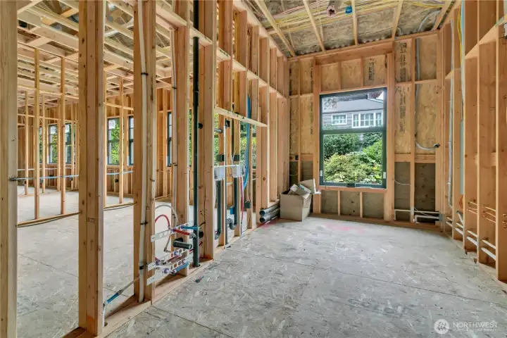 Another view of the laundry room, showing dryer venting out the side to allow for flush install of the unit along the back wall. Home as of 10/23