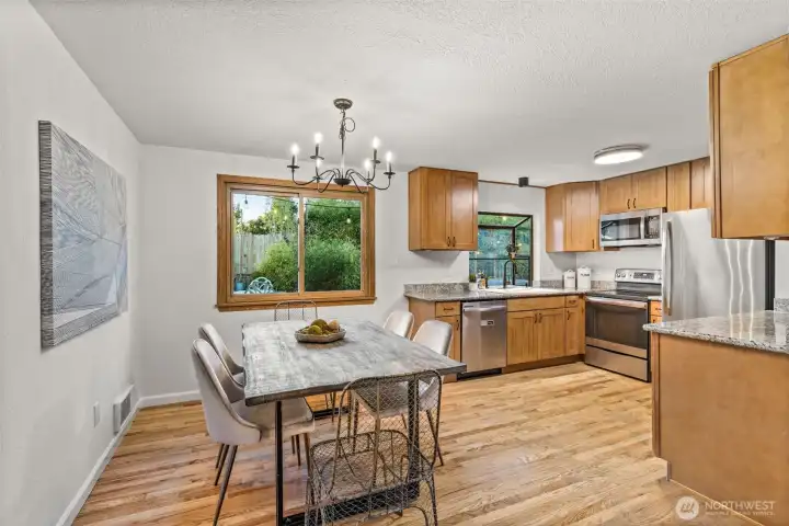 Freshly updated kitchen and dining area with seamless flow