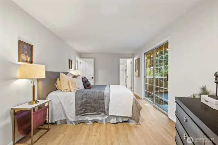 Generous primary suite with walk-in closet and ensuite bath