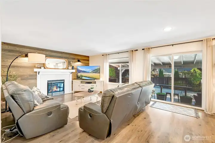 Family room opens out to the covered outdoor space, perfect for entertaining!