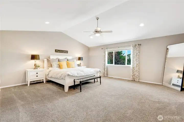 very spacious primary bedroom, lots of room in here for a sitting area!