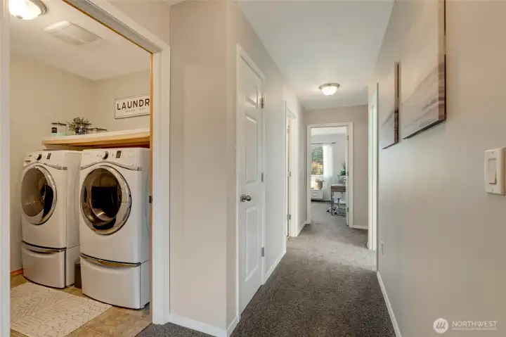2nd floor walk-in utility room, hallway to 3 additional bedrooms and hall bathroom. This layout is great, the owners suite is on the other end of the hallway
