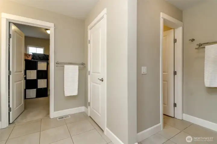 primary bathroom has a separate room for the toilet and shower