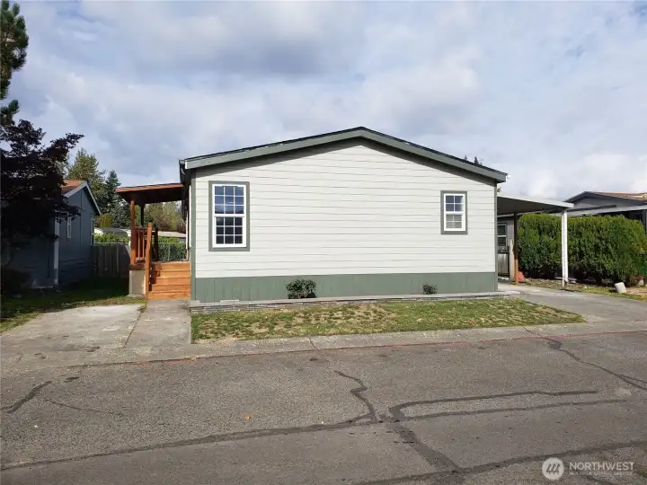 Front View of the Home with New Siding, Trim and Complete Exterior Paint.
