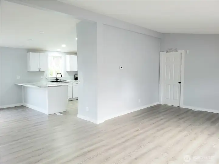 View of the Living Room looking into the Kitchen.