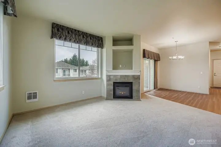 Welcoming living area with a cozy gas fireplace and room to entertain or unwind.