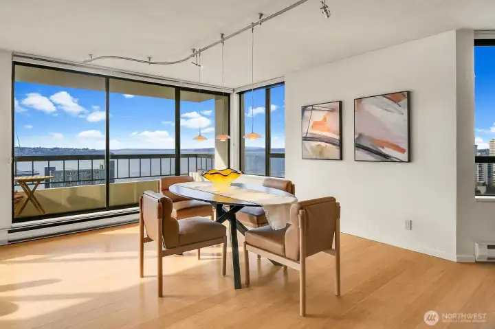 The dining room features view and an outdoor deck to enjoy the fresh air.