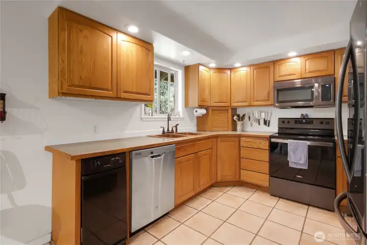 Kitchen has lots of lighting