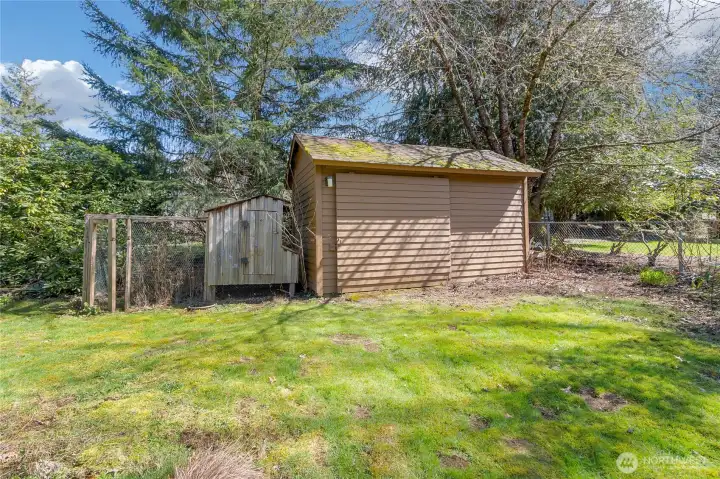 outbuilding with smaller chicken coop.