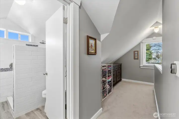 Primary bathroom and hallway