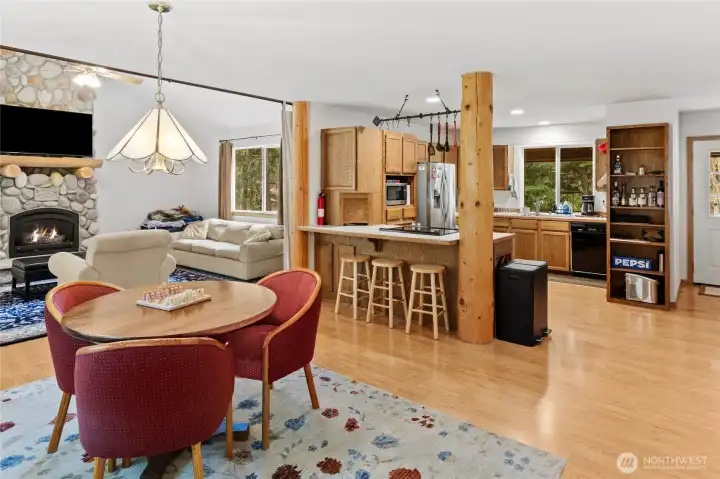 Open dining area flowing effortlessly from the living room—ideal for entertaining.