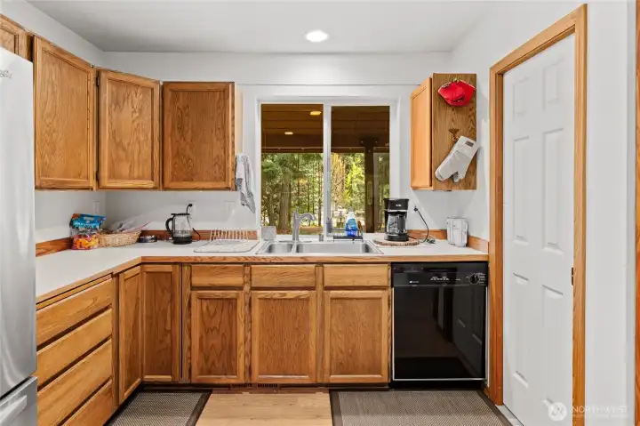 Kitchen features a pantry providing ample storage.