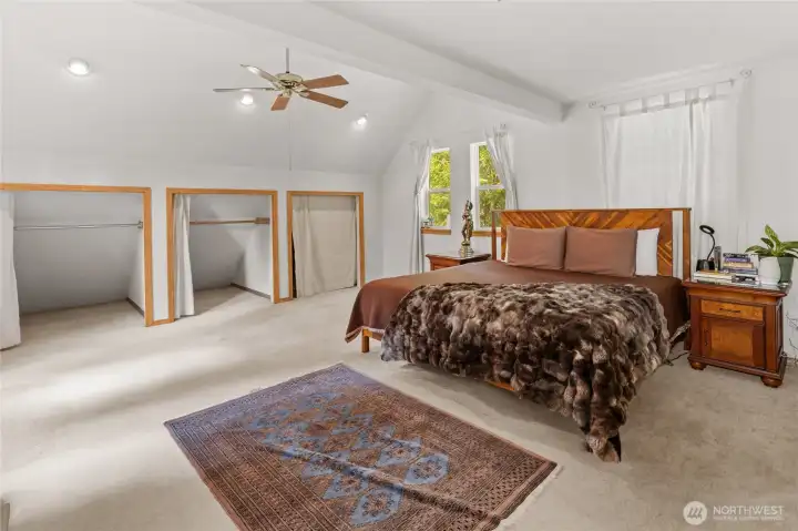Spacious primary suite on the upper level.