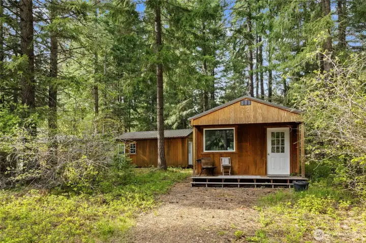 Three outbuildings offer unlimited potential for hobbies, storage, guest accommodations and more!
