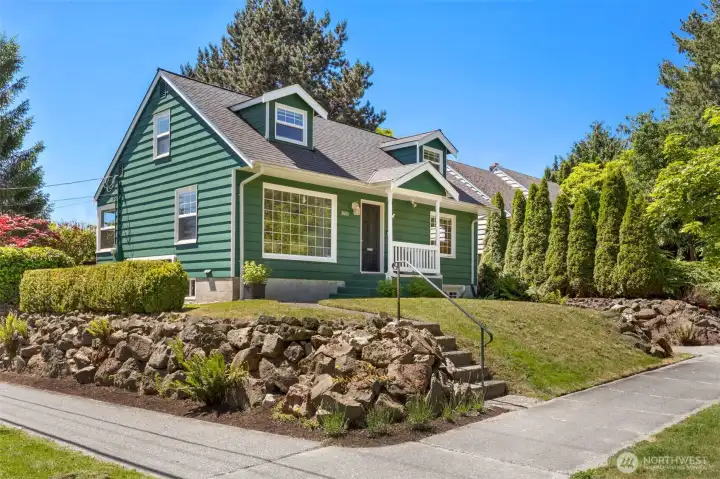 Home sits high on the street with privacy and light.
