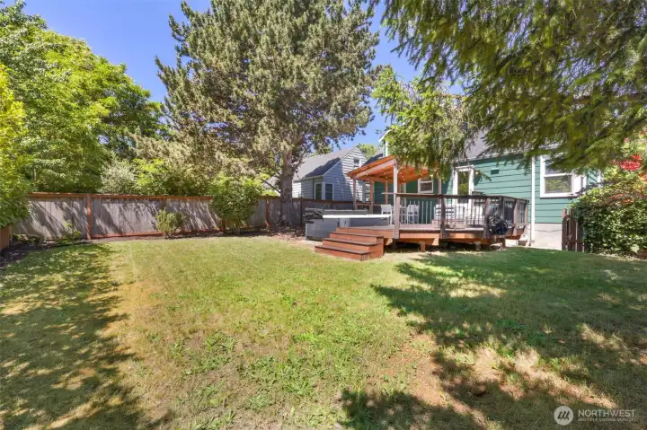 Lawn and garden space.  Cherry trees added in 2025.