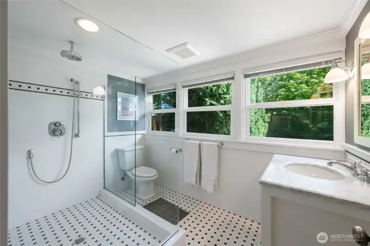 Stunning ensuite bath remodel with heated floors, imported italian tile, and carrara marble counters