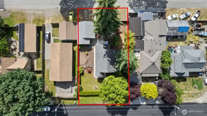 The large lot has alley access to the detached 2 car garage which is perfect for adding and A.D.U. on top.