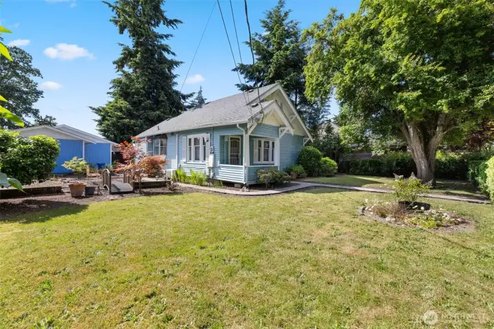 Gotta love the mature landscaping and big yard.