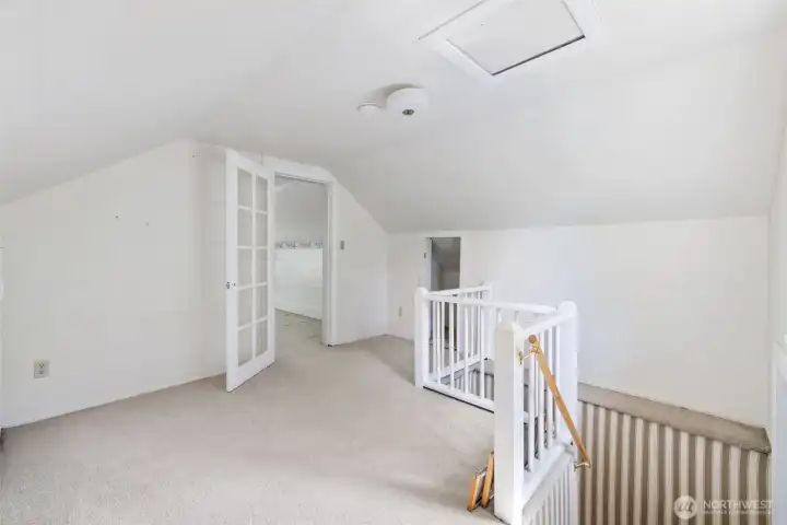 Let's head upstairs where we have a flex room, great for hobbies or an office, and a 3rd bedroom.