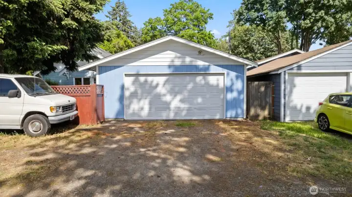 Not only do you get a two car garage, but there is parking in alley, as well.