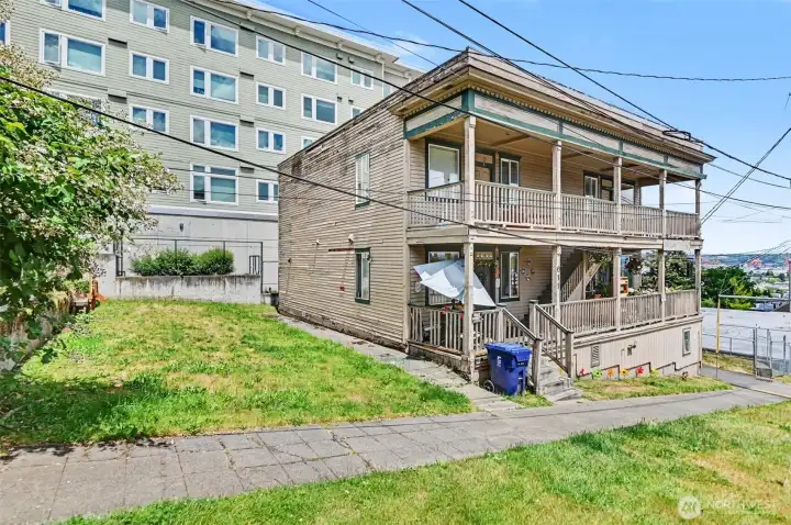 This well-located two-story fourplex features four spacious units.