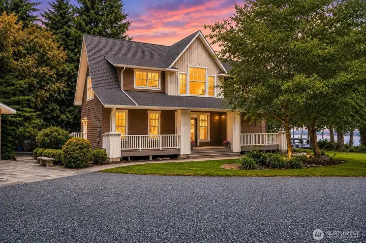 Private Island Oasis on almost 3 acres with stunning high-bluff water and mountain views.