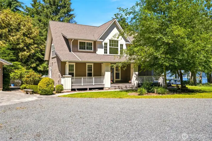 Private Island Oasis on almost 3 acres with stunning high-bluff water and mountain views.