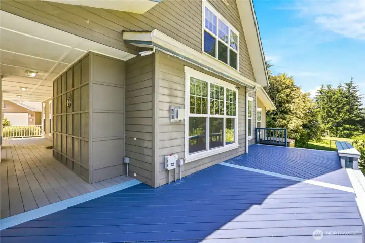 Generous deck space designed for outdoor living, with plenty of room for seating, dining, and enjoying the fresh island air.