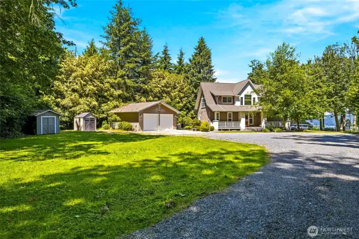 Nearly 3 private acres with expansive lawn space, abundant parking, and plenty of room for boats, RVs, trailers, and guests. Surrounded by mature trees, the property offers exceptional privacy while still showcasing beautiful water views and a peaceful island setting.