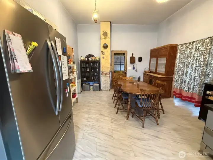 Behind the curtain is the laundry area