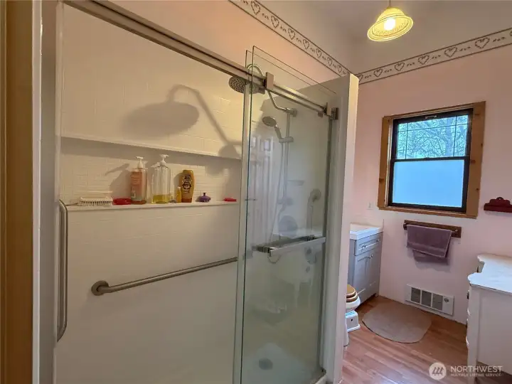 Bathroom next to primary bedroom on main floor