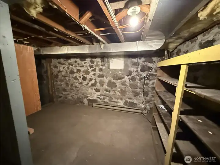 Basement with shelving on right hand side