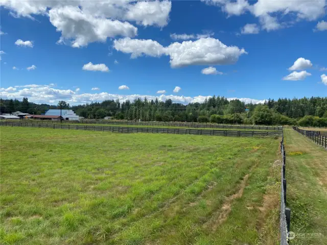 Looking back over the three pastures from the NE corner of the lot.