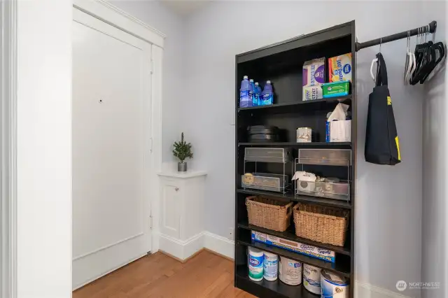 The entry hallway provides a thoughtful separation, allowing for added privacy in the main living area. This layout creates a welcoming first impression while maintaining a secluded and cozy feel for the heart of the home