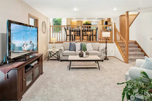 Family room has a wood burning stove that can heat most of the home and keep you warm and cozy during the winter!