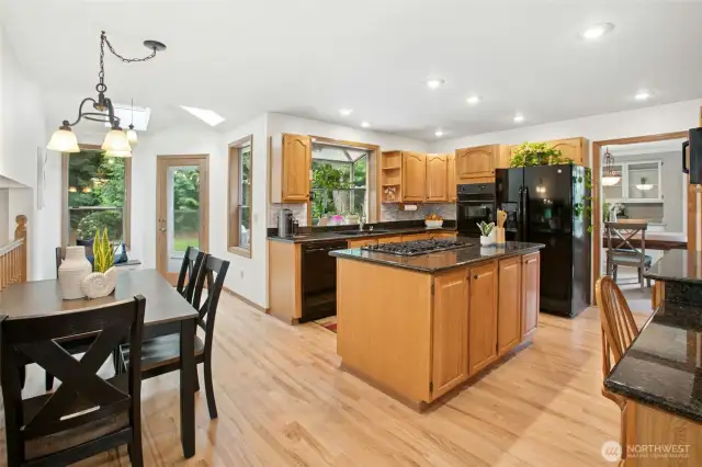 Comfortable eating space for more casual dining just off the kitchen.