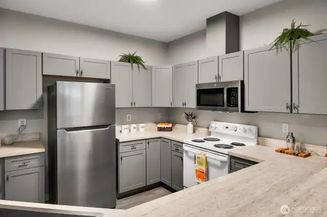Newer appliances, microwave, refrigerator and dishwasher