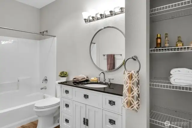 Updated main bath with tub.