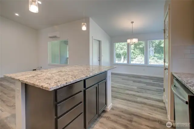 The island also has more storage, as well as an eating bar on the opposite side.