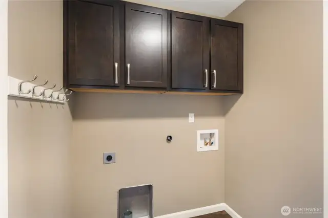 Laundry Room with upper cabinets for storage