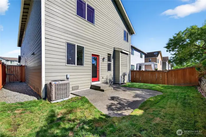 Private backyard featuring a patio area