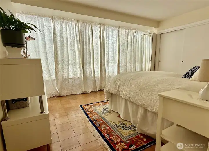 Primary bedroom with full bath is a soothing, serene retreat.