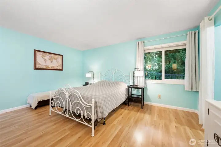 Spacious primary bedroom with walk in closet and ensuite bath.