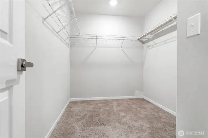 Primary Suite Walk-In Closet.