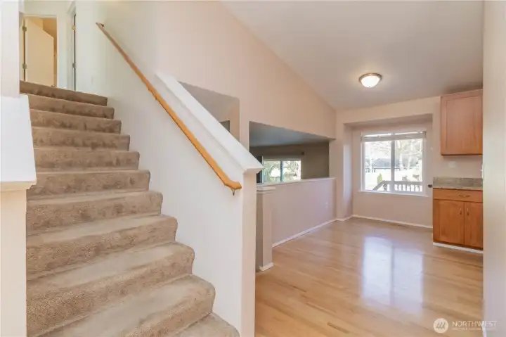 Stairs to bedrooms upstairs and two full bathrooms.