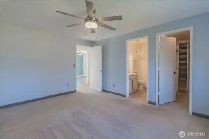 Primary bedroom with bathroom and closet