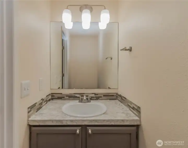 Half bathroom downstairs.